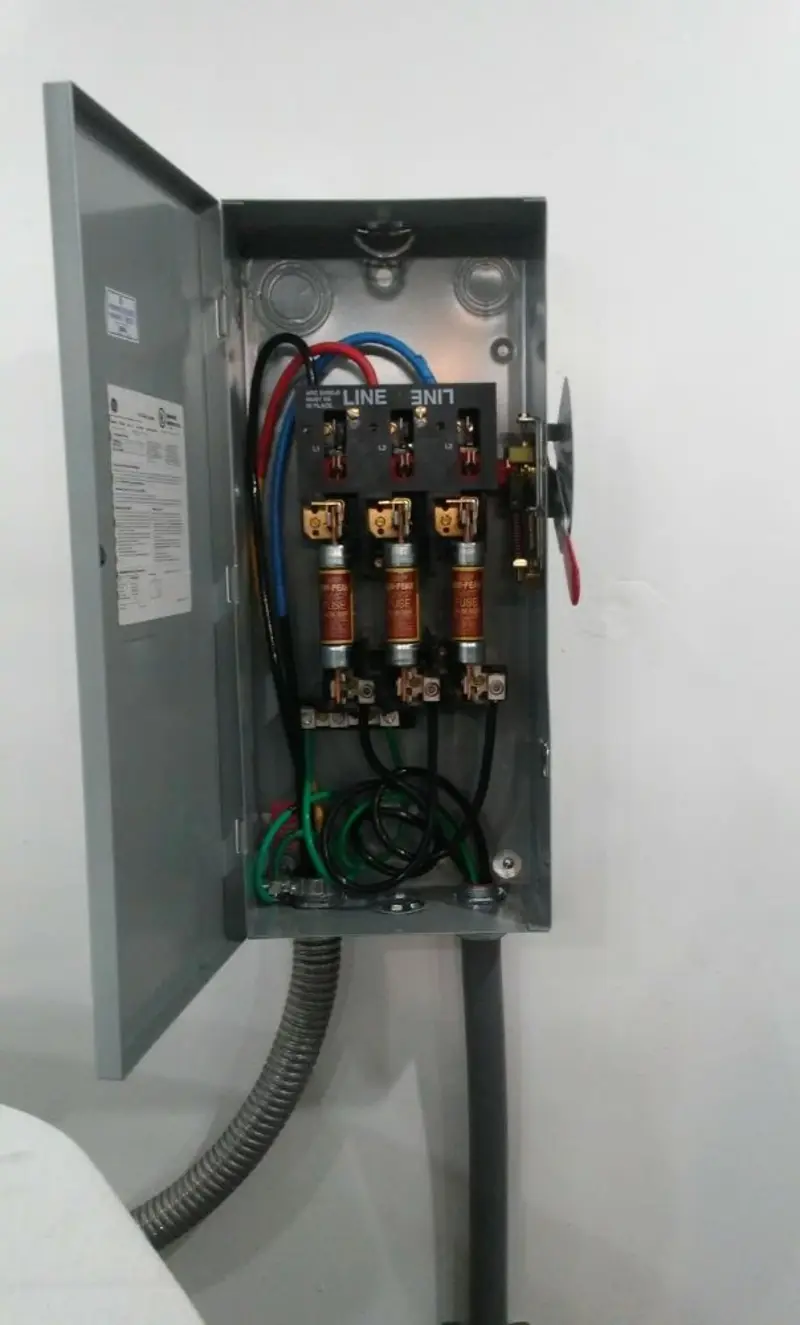 Three-phase disconnect switch installed for Smoke Detector Installation in Indiantown